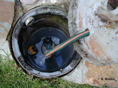 This photo shows the sump bucket that collects greywater from the household