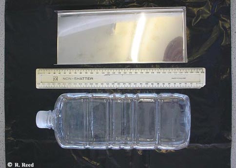This photo shows the standard water bottle and reflective backing used in the field study